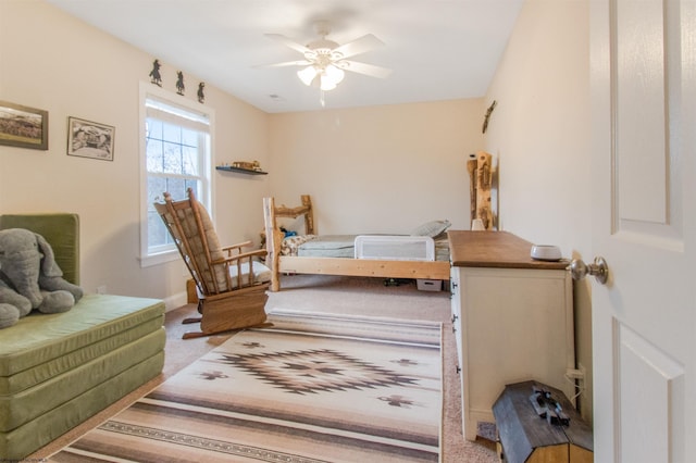 bedroom featuring carpet flooring and ceiling fan