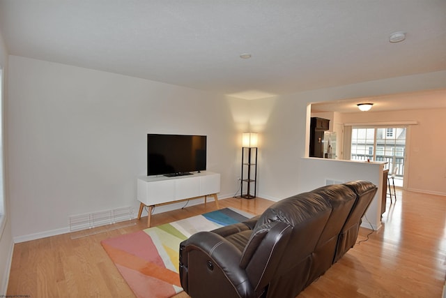 living room featuring light wood-type flooring