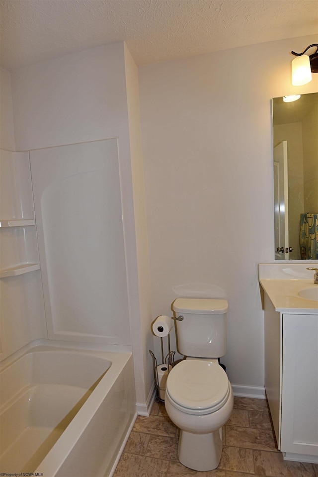 full bathroom featuring separate shower and tub, vanity, a textured ceiling, and toilet