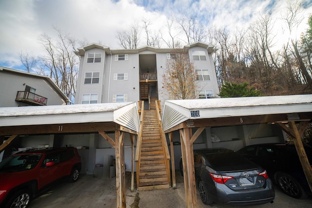 exterior space with a carport