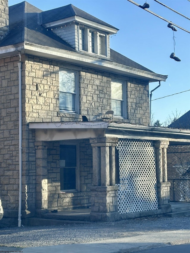 view of front of home featuring stone siding