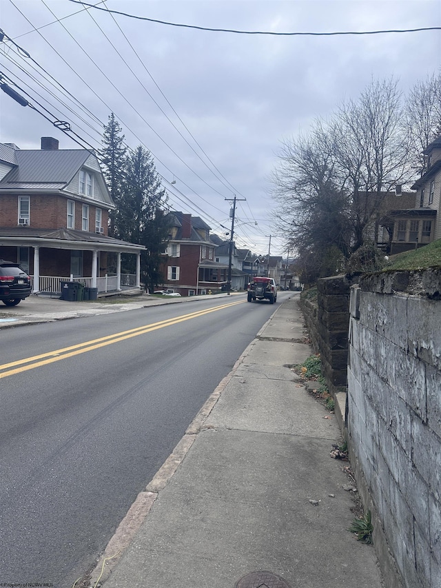 view of street featuring curbs and sidewalks