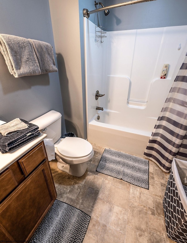 full bathroom featuring vanity, toilet, and shower / bath combo with shower curtain