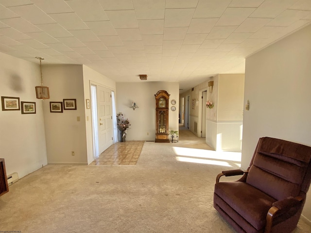 living area with light colored carpet