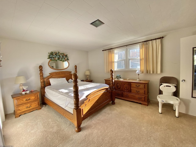 bedroom featuring light colored carpet