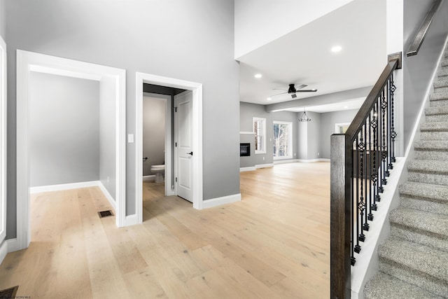 interior space with hardwood / wood-style flooring and ceiling fan