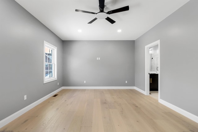 unfurnished room with light hardwood / wood-style floors and ceiling fan