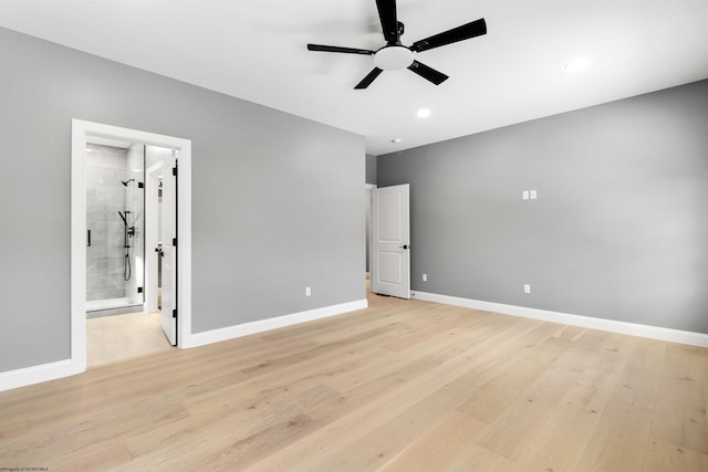 unfurnished bedroom with connected bathroom, ceiling fan, and light hardwood / wood-style flooring