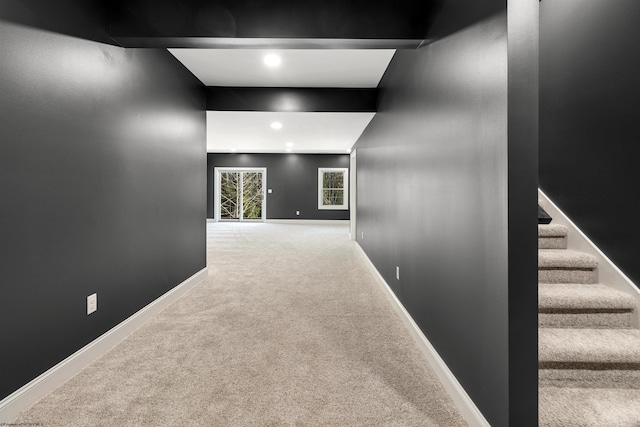 hallway featuring carpet floors