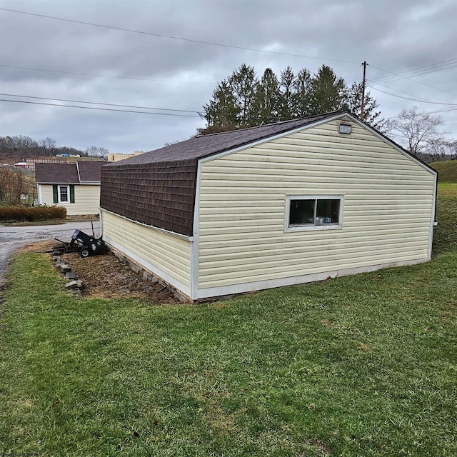 view of home's exterior featuring a yard