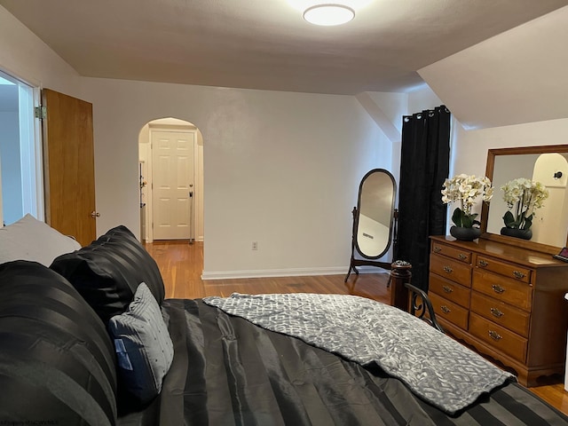 bedroom with light hardwood / wood-style floors