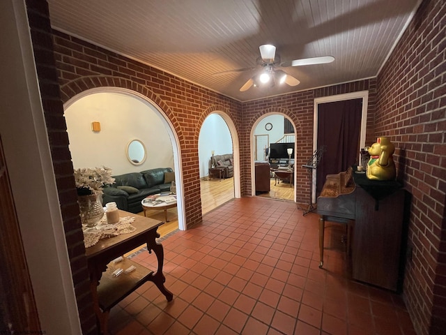 view of patio / terrace featuring ceiling fan and an outdoor kitchen