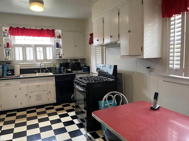 kitchen featuring sink, white cabinets, black appliances, and range hood