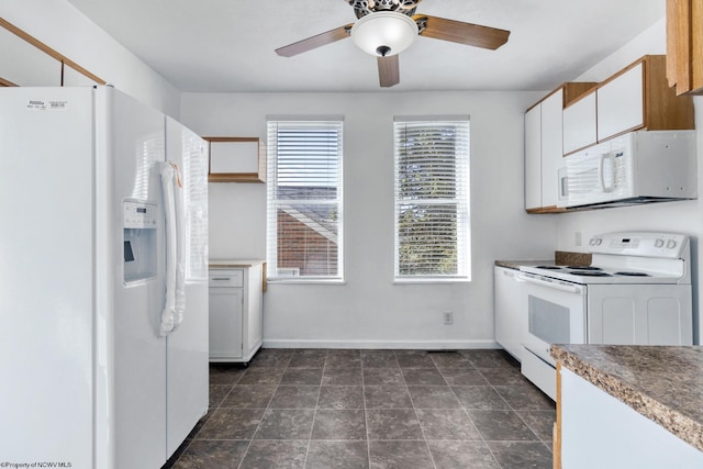 kitchen featuring ceiling fan, white cabinetry, and white appliances