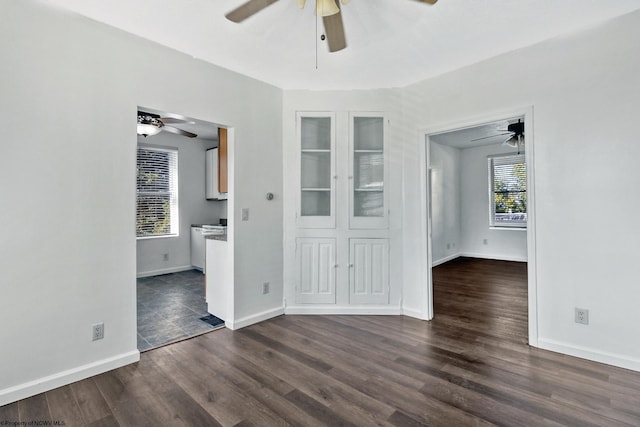 unfurnished room featuring dark hardwood / wood-style flooring