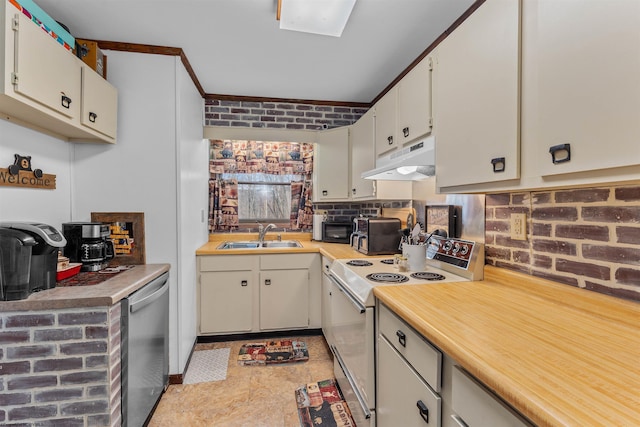 kitchen with sink, range with electric cooktop, stainless steel dishwasher, white cabinetry, and brick wall