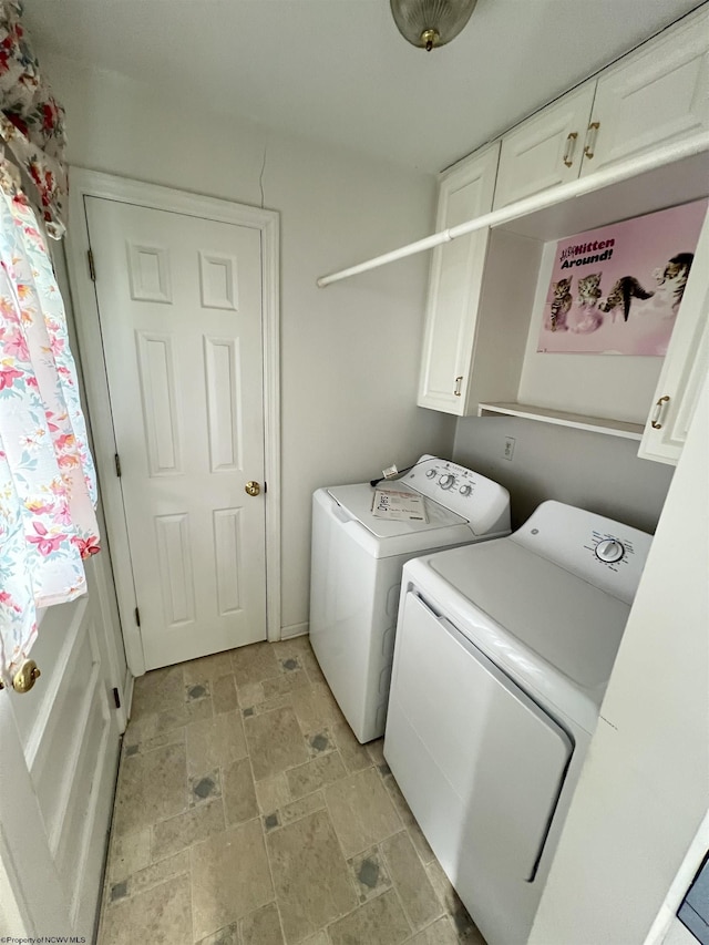 laundry area with cabinets and washer and dryer