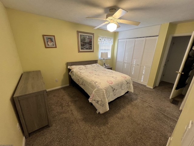 bedroom featuring a closet, dark carpet, and ceiling fan