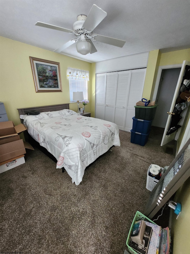 carpeted bedroom featuring a closet and ceiling fan