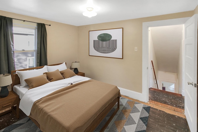 bedroom featuring wood-type flooring