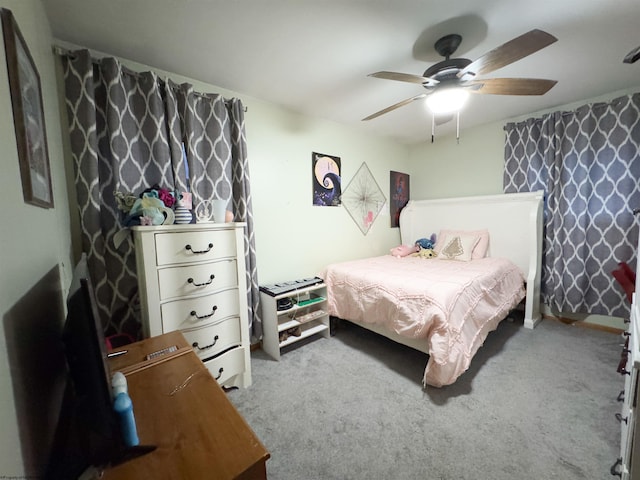 bedroom featuring ceiling fan and carpet floors