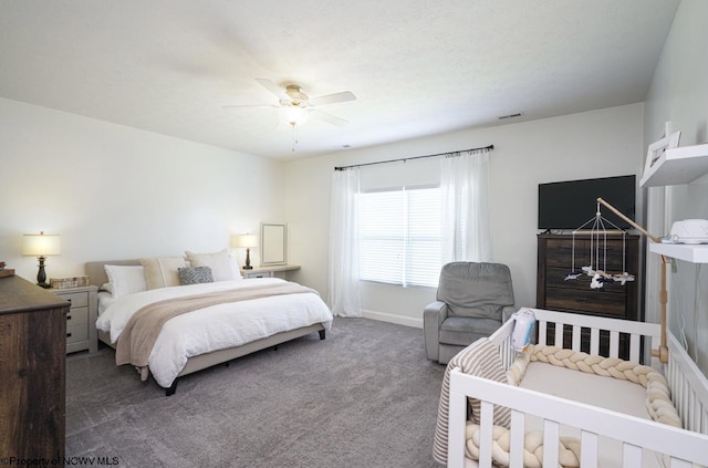 carpeted bedroom featuring ceiling fan