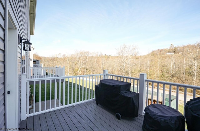 wooden deck with area for grilling