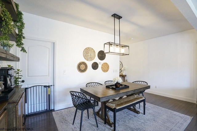 dining room featuring dark hardwood / wood-style flooring