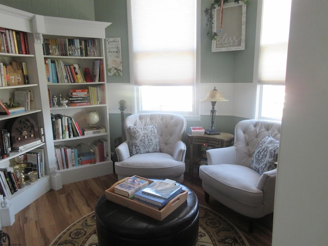 living area with a healthy amount of sunlight and wood-type flooring