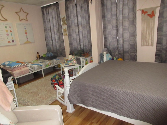 bedroom featuring hardwood / wood-style floors