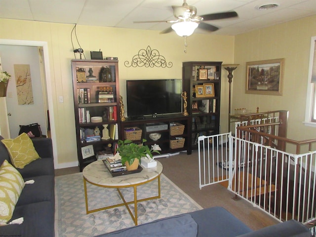 living room featuring ceiling fan