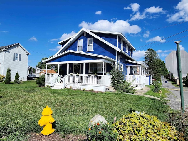 view of front facade with a porch and a front yard