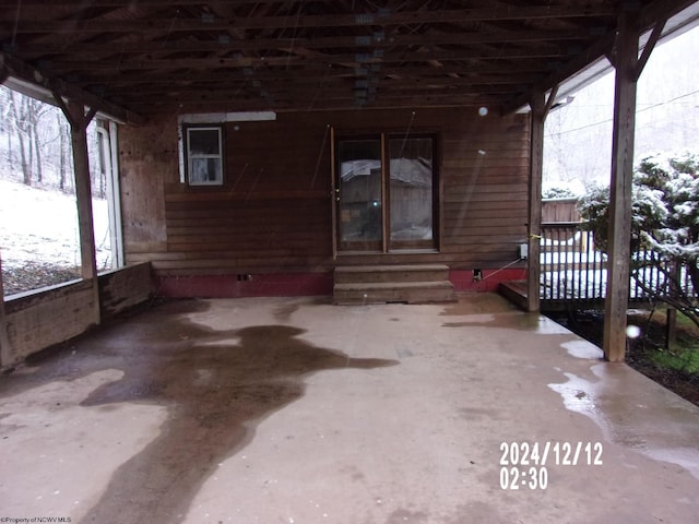 view of snow covered patio