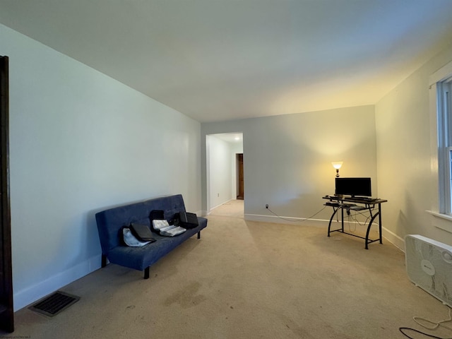 sitting room with light carpet