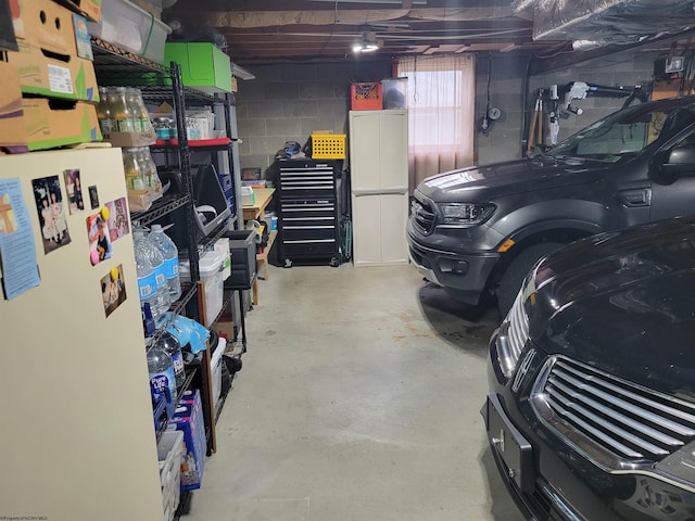 garage with white refrigerator