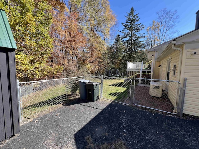 view of yard featuring a wooden deck