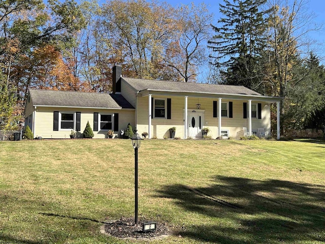 view of front facade with a front yard