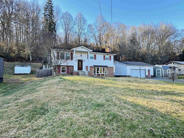 raised ranch featuring a front yard