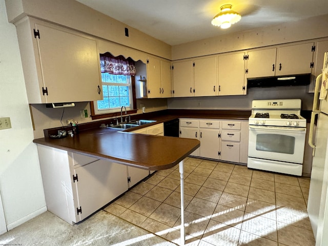 kitchen with white cabinets, light tile patterned floors, white appliances, and sink