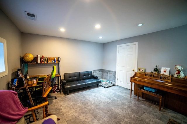 office space featuring recessed lighting and visible vents