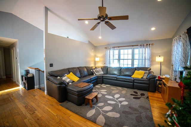 living room featuring hardwood / wood-style floors, lofted ceiling, recessed lighting, and a ceiling fan