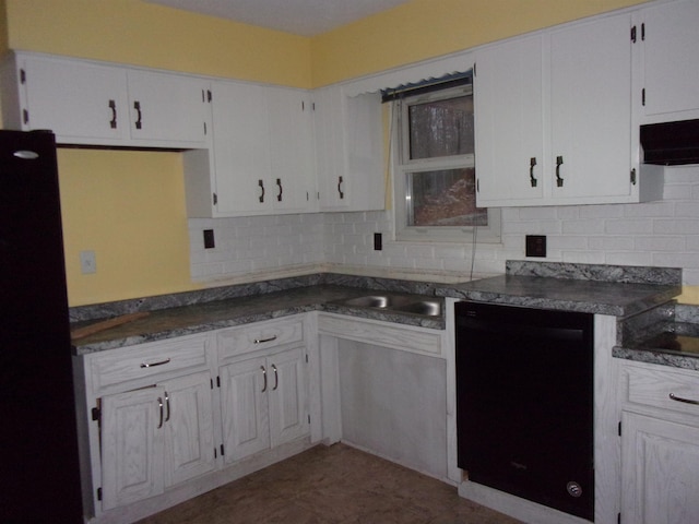 kitchen featuring decorative backsplash, sink, white cabinets, and black appliances