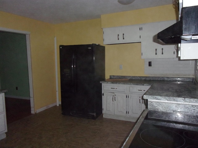 kitchen with white cabinets, black fridge with ice dispenser, extractor fan, and tasteful backsplash