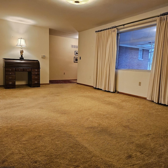 unfurnished room with carpet floors