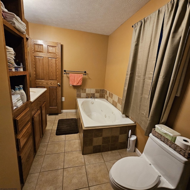 bathroom with tile patterned floors, tiled tub, a textured ceiling, and toilet