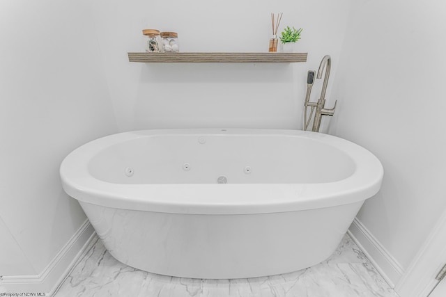 bathroom featuring a washtub