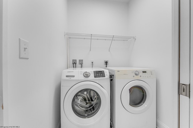 laundry area featuring separate washer and dryer