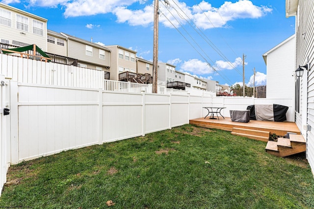 view of yard featuring a wooden deck