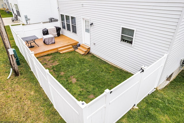 view of yard with a deck