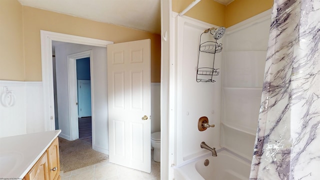 full bathroom featuring shower / bath combo, vanity, and toilet